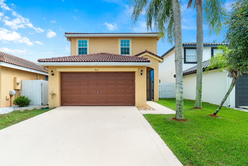 Photo of 7812 Springfield Lake Drive, Lake Worth, FL 33467 (MLS # R11118371)