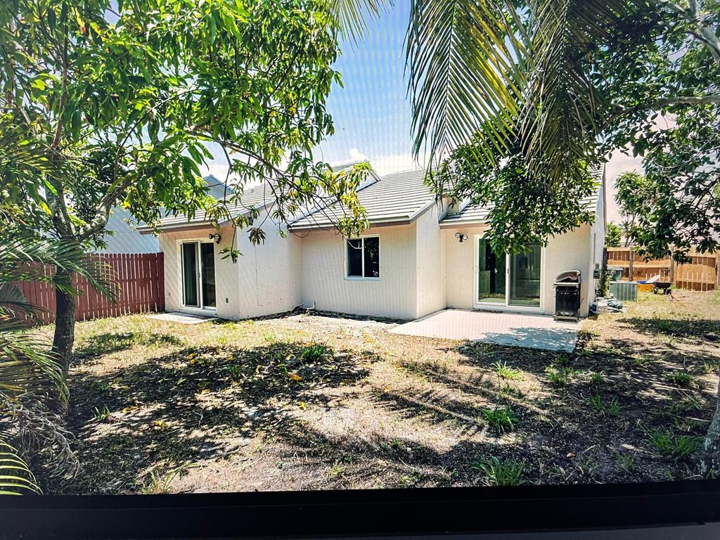 Photo of 5856 Strawberry Lakes Circle, Lake Worth, FL 33463 (MLS # R11162107)