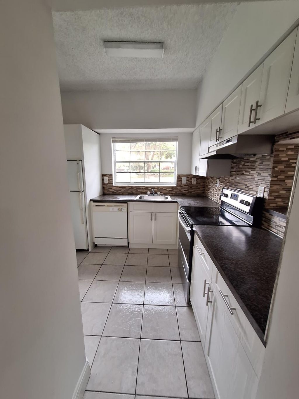 Photo of 1821 NW 96th Terrace #5f, Pembroke Pines, FL 33024 (MLS # B26014463)