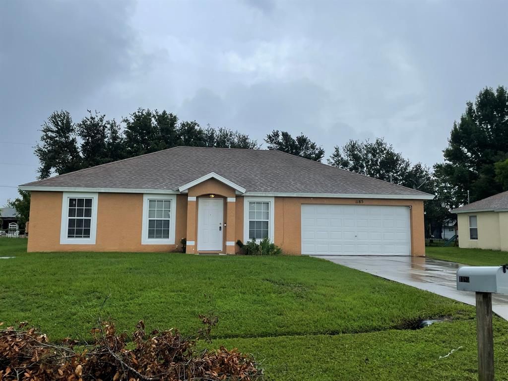 Photo of 1185 SE Puritan Lane, Saint Lucie West, FL 34983 (MLS # R10728144)