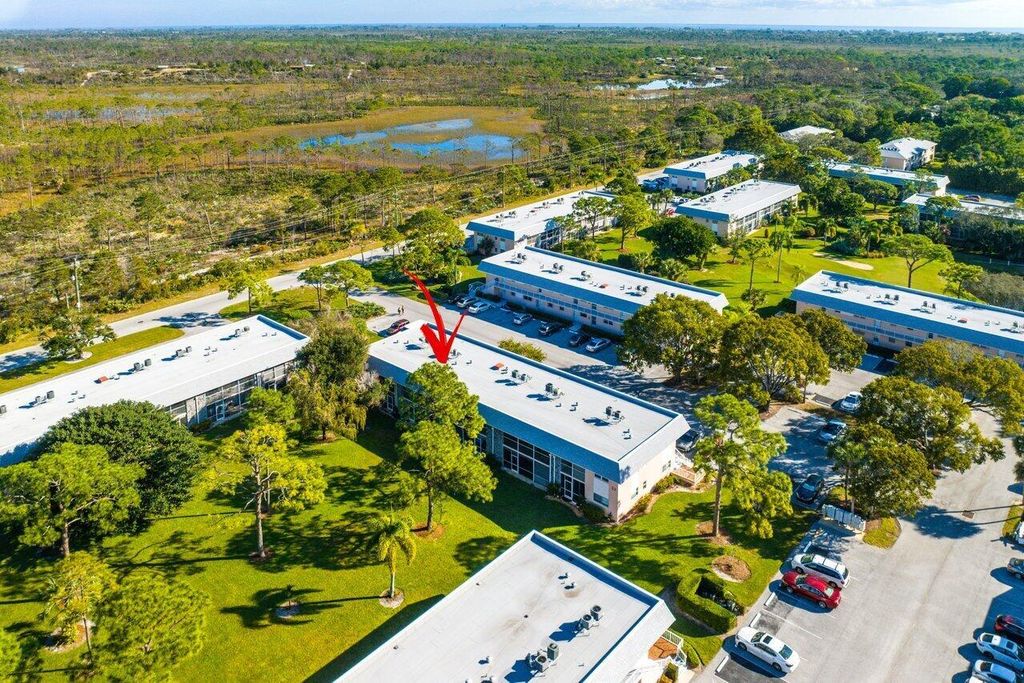 Photo of 18081 SE Country Club Drive #213, Tequesta, FL 33469 (MLS # R10956433)