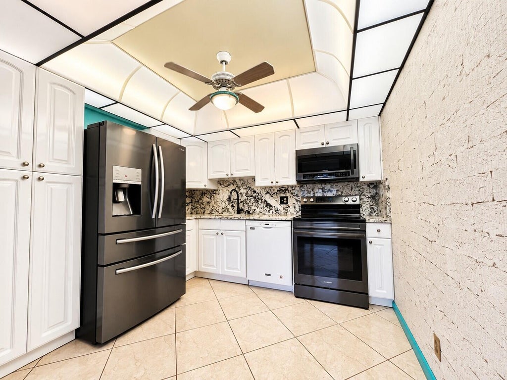 Photo of 110 WELLINGTON B, West Palm Beach, FL 33417 (MLS # B26083237)