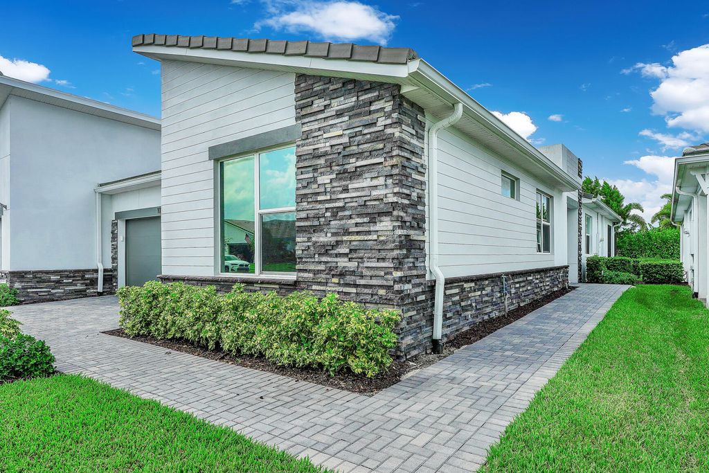 Photo of 10219 SW Corvus Lane, Port Saint Lucie, FL 34987 (MLS # R11147119)