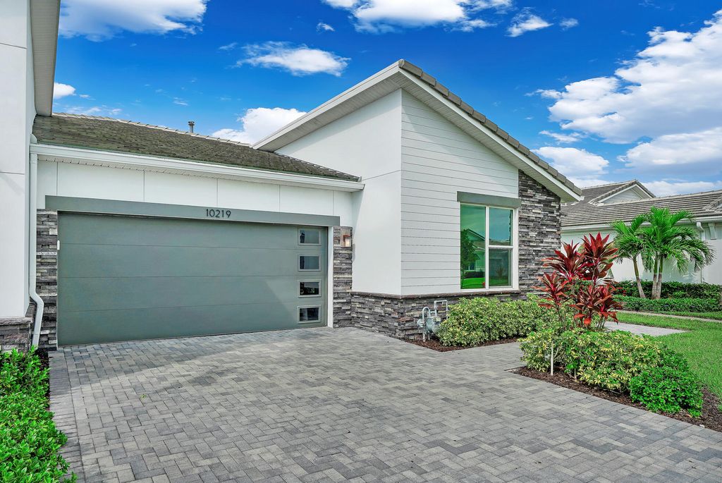 Photo of 10219 SW Corvus Lane, Port Saint Lucie, FL 34987 (MLS # R11147119)