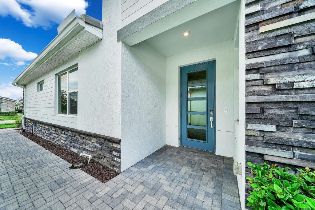 Photo of 10219 SW Corvus Lane, Port Saint Lucie, FL 34987 (MLS # R11147119)