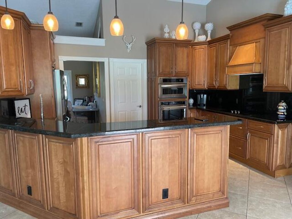 Photo of 1618 SW Lexington Dr Dr NW, Port Saint Lucie, FL 34953 (MLS # R11089615)