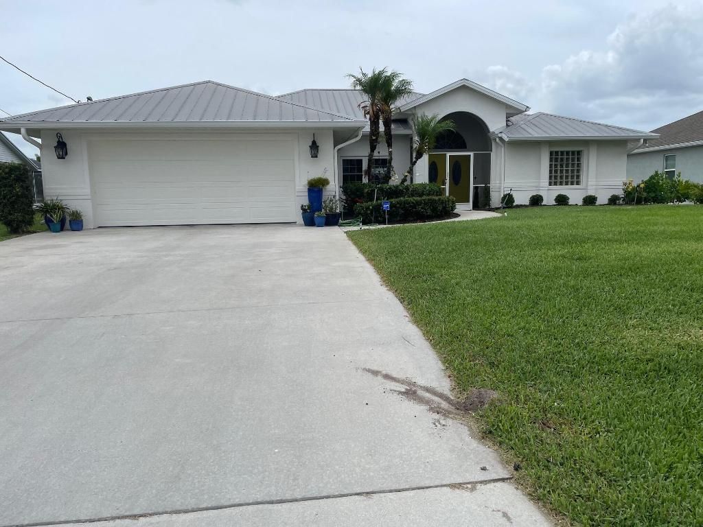 Photo of 1618 SW Lexington Dr Dr NW, Port Saint Lucie, FL 34953 (MLS # R11089615)