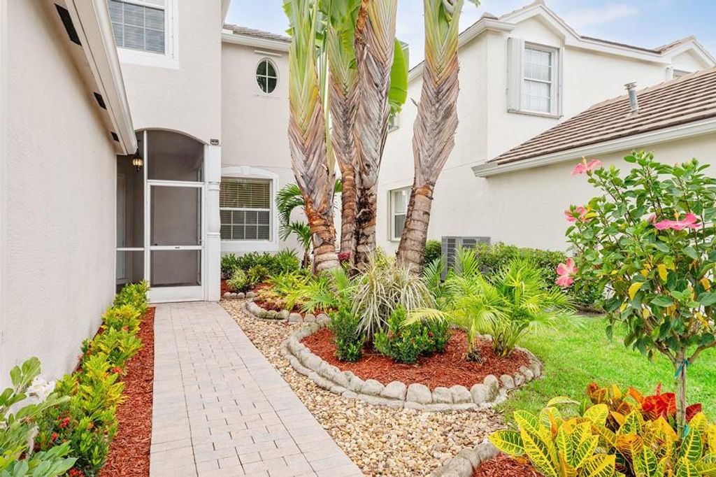 Photo of 106 Newberry Lane, Royal Palm Beach, FL 33414 (MLS # F10527835)