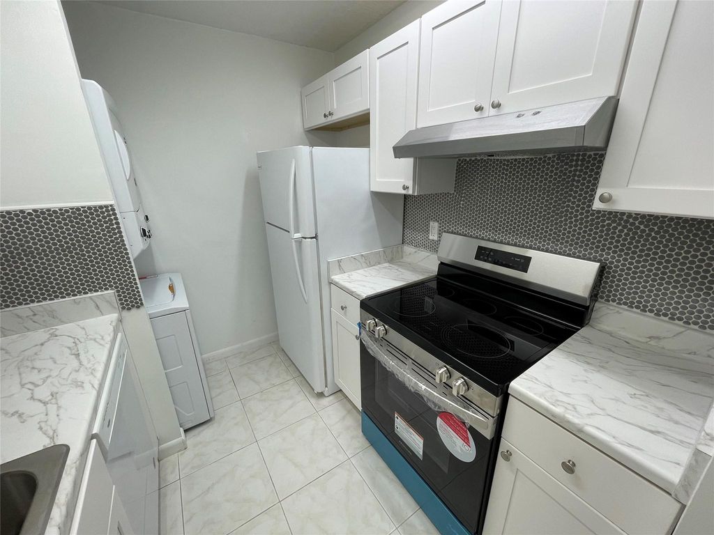 Photo of 10222 Twin Lakes Dr #10222, Coral Springs, FL 33071 (MLS # F10513127)