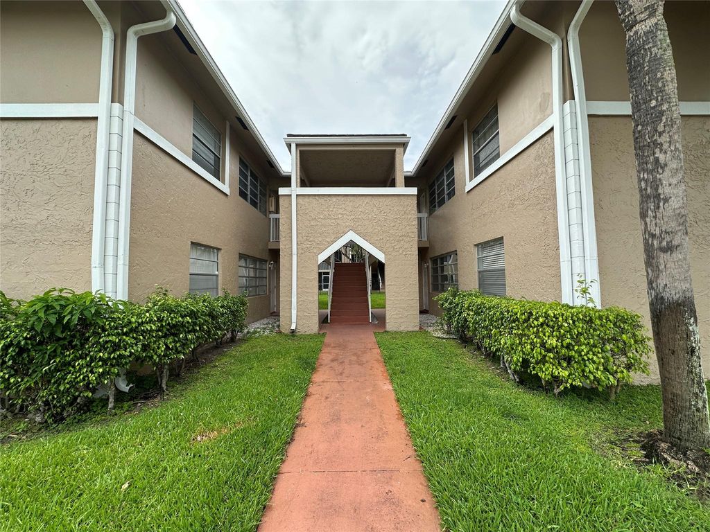Photo of 10222 Twin Lakes Dr #10222, Coral Springs, FL 33071 (MLS # F10513127)