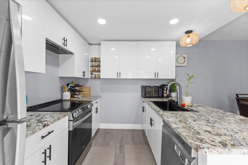 Photo of 2704 27th Way, West Palm Beach, FL 33407 (MLS # R11153027)