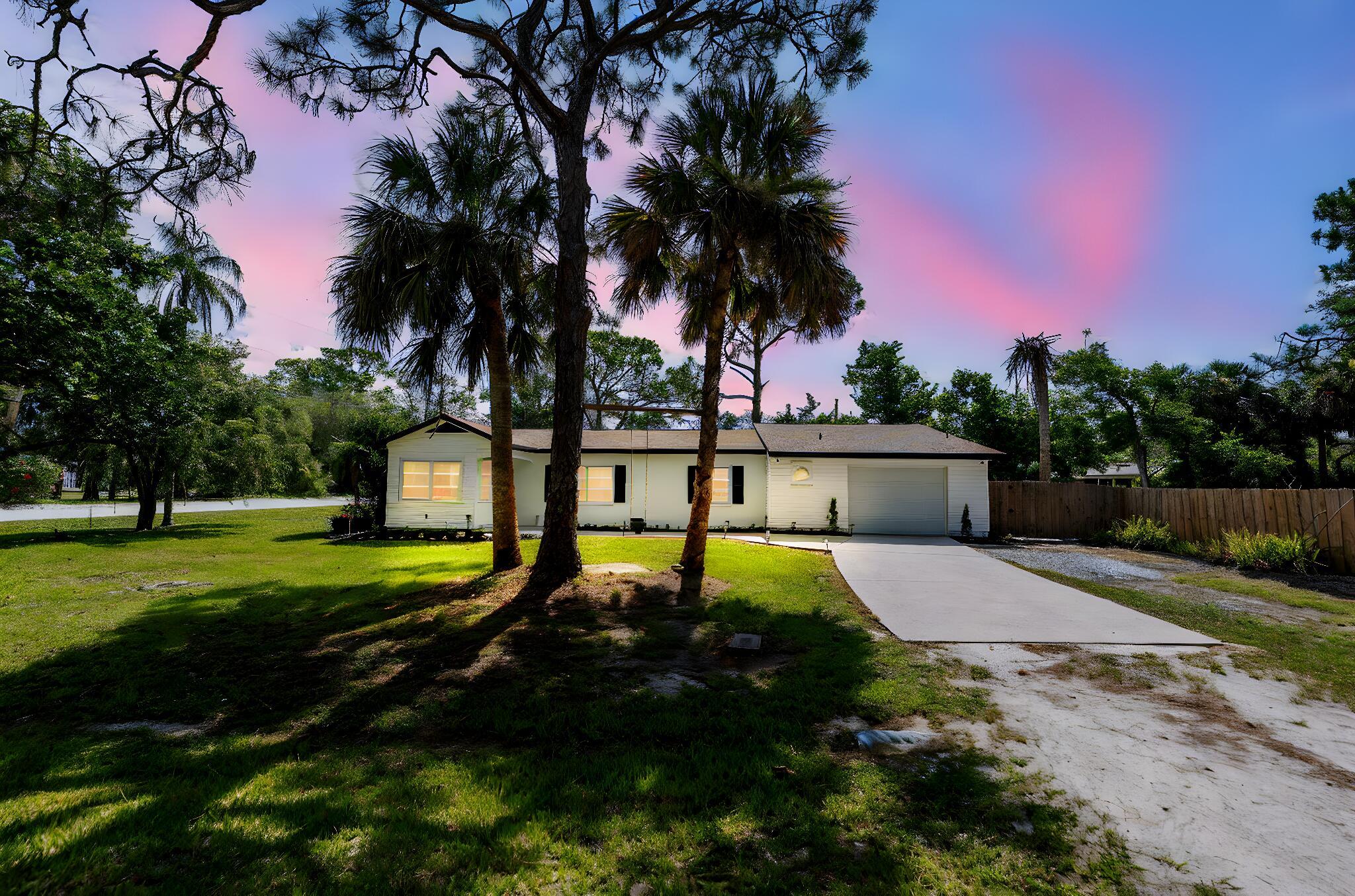 This 3-bedroom, 2-bathroom home offers just under 2,000 sq ft of comfortable living space and is nestled on a generously sized corner lot just under half an acre--perfect for privacy, entertaining, or future outdoor enhancements. Build your Barn have chickens, toys, RV's and a pool. The possibilities are endless!Step inside to brand-new luxury vinyl plank flooring, fresh interior paint with mold-resistant qualities, and stylish new light fixtures throughout. The exterior has also been freshly painted, giving the home great curb appeal. Enjoy the convenience of a brand-new refrigerator, updated doors, and more!A rare find with this much space, modern updates, and move-in ready condition--schedule your showing today!