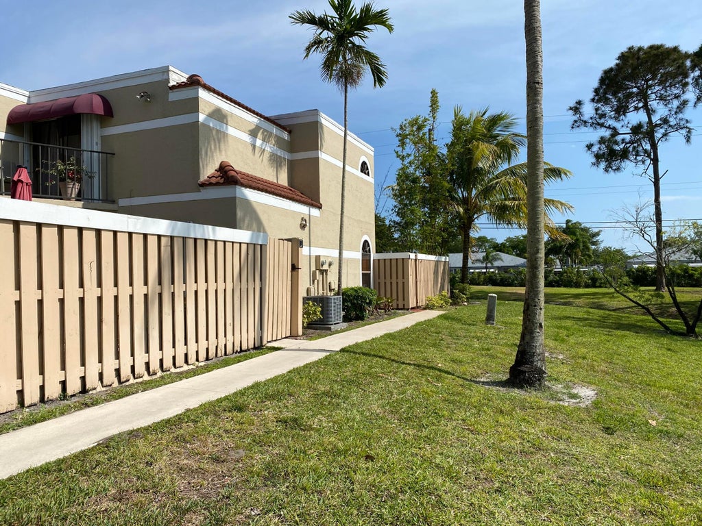 Photo of 3770 Village Drive #C, Delray Beach, FL 33445 (MLS # R11080347)