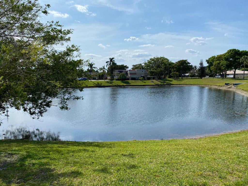 Photo of 3770 Village Drive #C, Delray Beach, FL 33445 (MLS # R11080347)