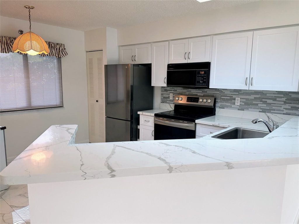 Photo of 2238 N Cypress Bend Drive #508, Pompano Beach, FL 33069 (MLS # F10406772)