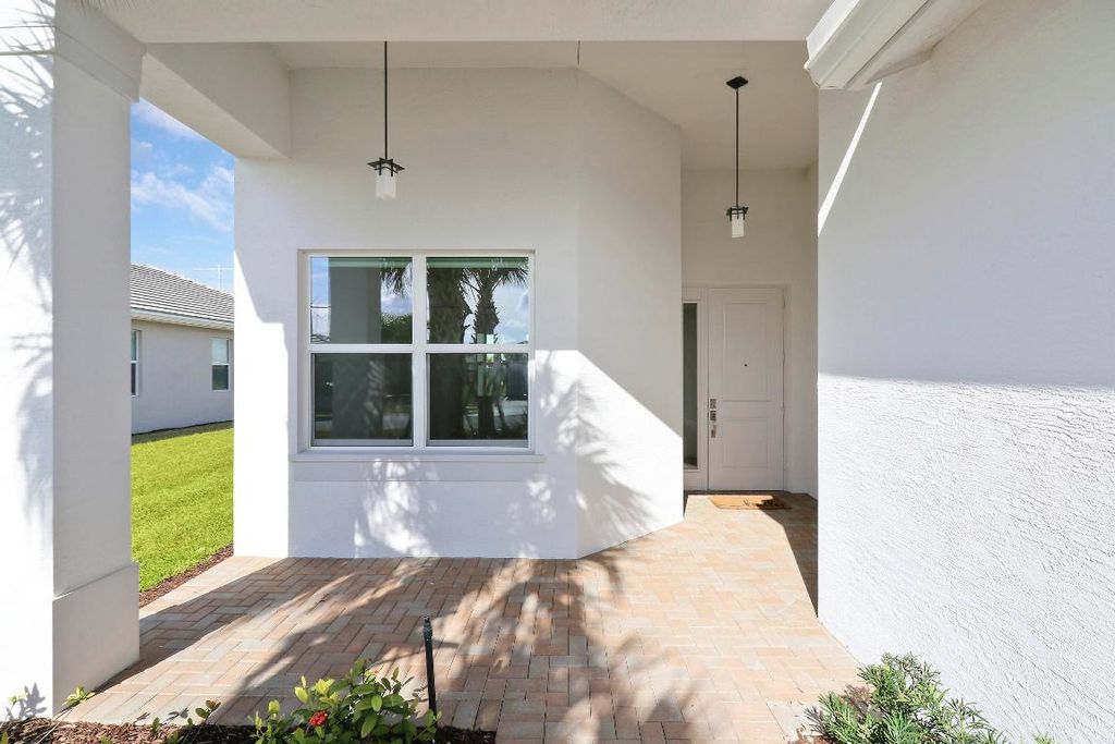 Photo of 13439 SW River Rock Road, Port Saint Lucie, FL 34987 (MLS # R10941925)