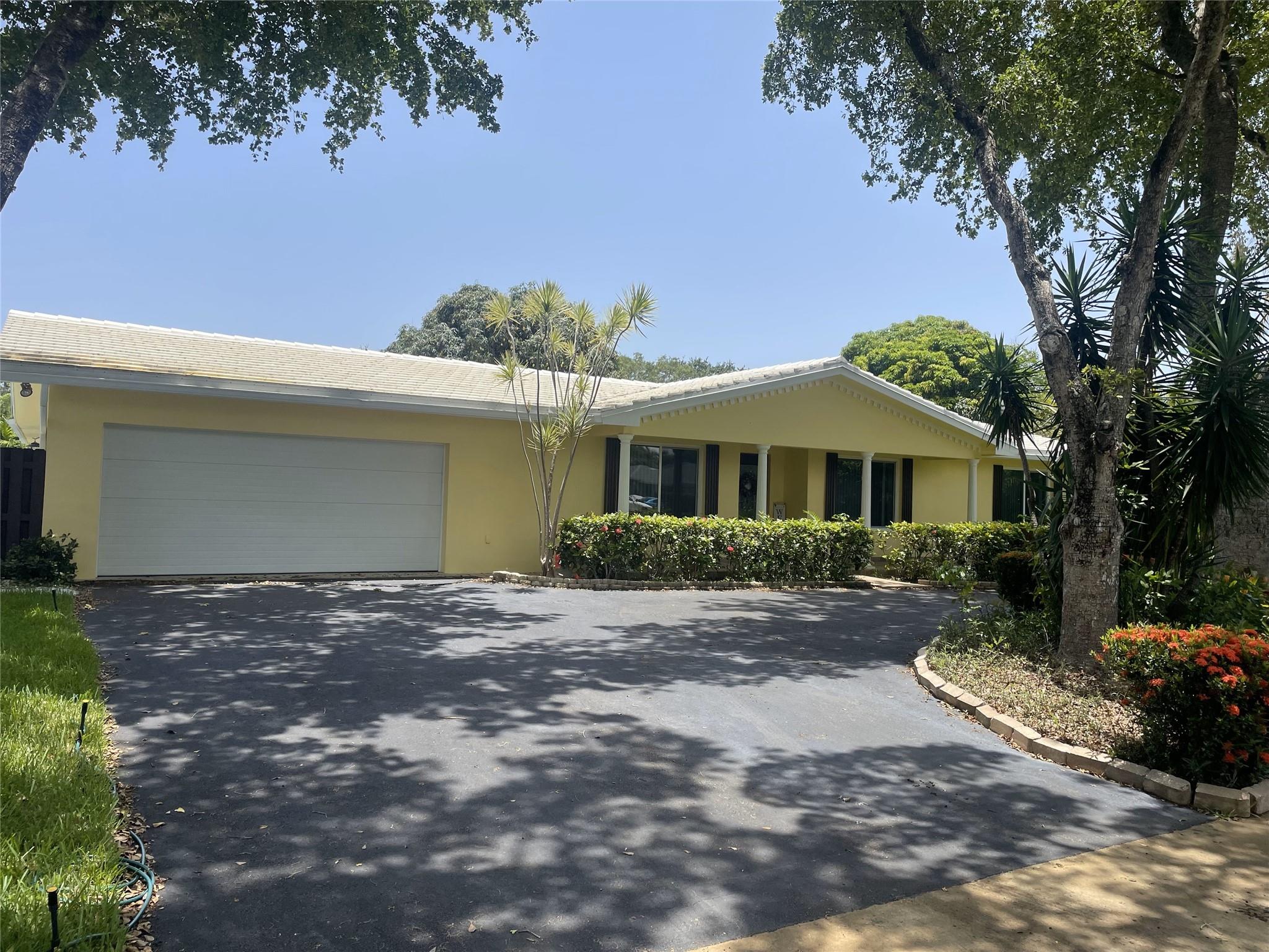 Expanded 6-bed (5+ conversion), 3.5-bath home in Plantation with a recently refinished screened-in pool & spacious patio—perfect for entertaining family and friends. New laminate flooring throughout, freshly painted interior, and stainless steel appliances in the kitchen. The garage is built out. Features 3 newer A/C units & PACE solar panels, keeping electric bills around $160/m. Combination of impact windows and shutters. Fenced backyard with fruit trees, 2 attached storage sheds, RV or boat parking with entrance through the back of the home, & a circular driveway. Lots of storage throughout. Roof is in great shape. No HOA & no restrictions. Rarely available expanded model. Direct back gate access to Tropical Elem. Large lot to accommodate all your needs. Move-in ready & waiting for you!