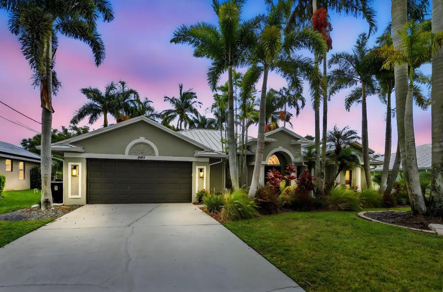 Discover this distinctive 3-bedroom, 2-bath, CBS home, with an attached 2-car garage, on a quiet street in the highly desirable Torino neighborhood. This property shows like a model with an inviting, wide-open floor plan, split-bedrooms and beautiful wood laminate flooring throughout every room. The well-appointed gourmet kitchen has been stylishly updated with quartz countertops, stainless steel appliances, and grey cabinets. You will love the designer Plantation Shutters and crown molding. A newer metal roof was installed in 2022, and the AC system was replaced in 2016. The large screened patio opens to a lushly landscaped, fenced backyard, deck and tranquil outdoor space with koi pond and BBQ area.  Top location convenient to shopping, schools, access to I95 and area beaches.