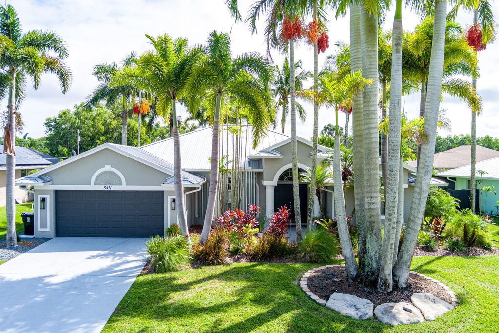 Photo of 5411 NW Cromey Street, Port Saint Lucie, FL 34986 (MLS # R11128931)