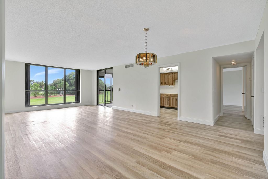 Photo of 5350 Woodland Lakes Drive #208, Palm Beach Gardens, FL 33418 (MLS # R11018347)