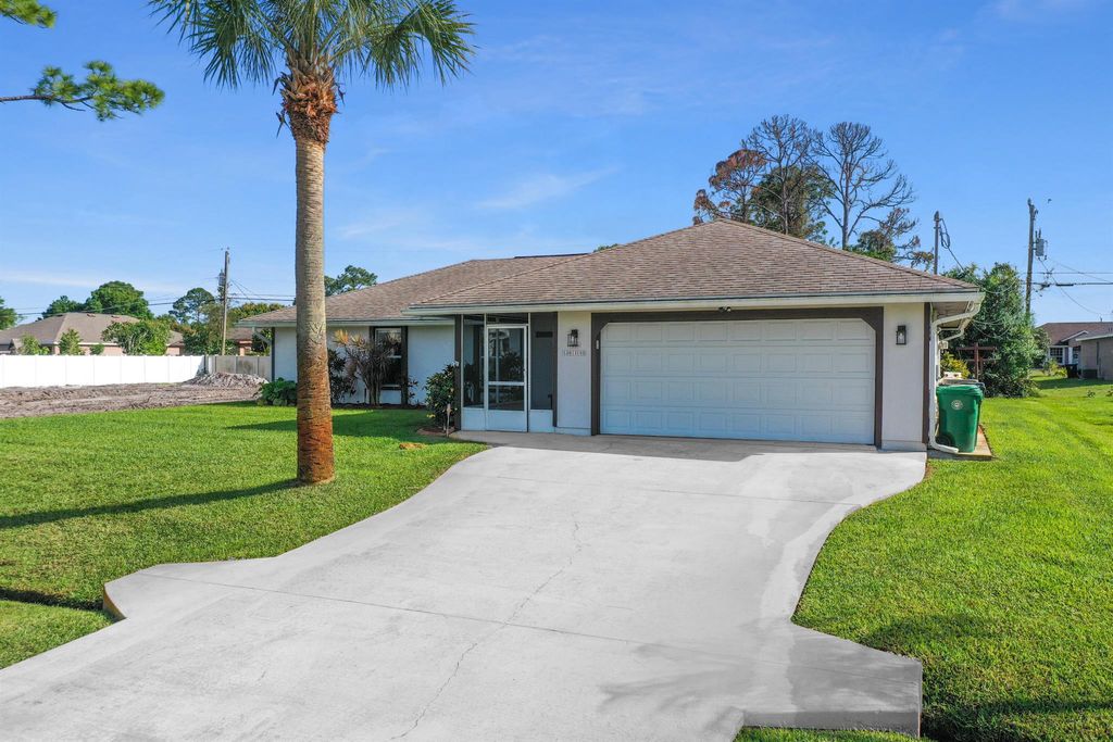 Photo of 1226 SW Albenga Avenue, Port Saint Lucie, FL 34953 (MLS # R10969983)