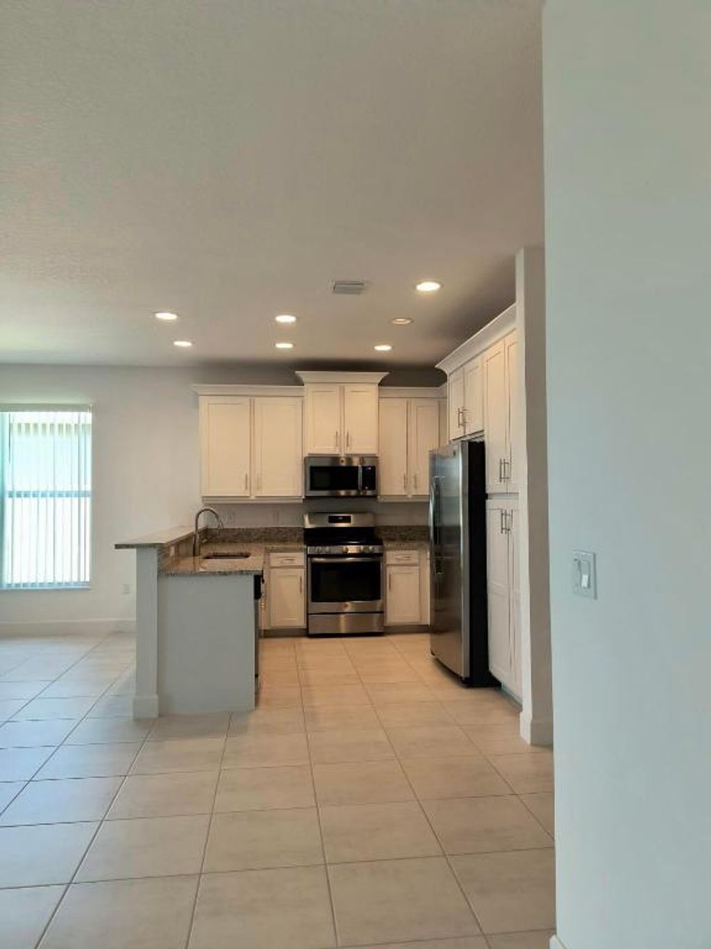 Photo of 12145 SW Jasper Lake Way, Port Saint Lucie, FL 34987 (MLS # R10937227)