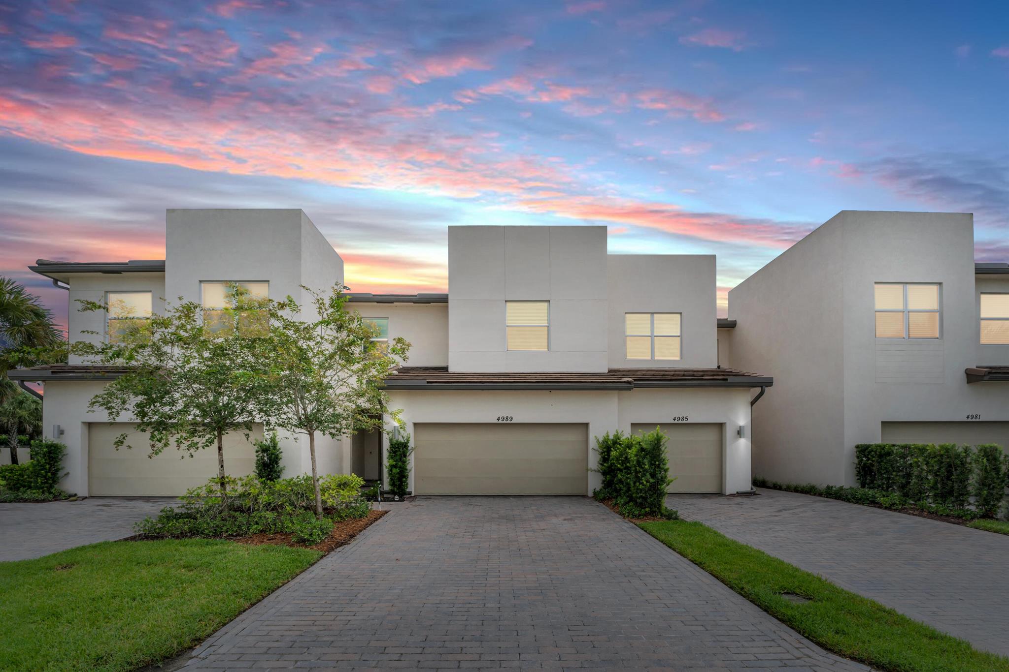 STUNNING! NEWLY BUILT 2021* LUXURY TOWNHOME located in the Newer Community of ANDALUCIA. BONUS* Seller Credit Towards Closing Cost! Experience this Modern 3 Bedrooms, 2.5 Bath, 2 CG townhome featuring an Open Concept floor plan w/a formal entry and soaring ceilings. Upgraded finishes include Wood Cabinetry, Quartz C-tops, SS Appliances and BEAUTIFUL Wood designed tile on main floor. Upstairs leads to 3 spacious bedrooms and 2 baths, High ceilings, HUGE Laundry room and Beautiful Primary Retreat w- En-suite. All Impact Windows/ Doors for easy living. The expansive backyard enhanced w- a privacy wall offers a tranquil retreat for relaxation. Wonderful amenities including pool, gym, Cabana and open BBQ area. Gated entry, great schools and prime location close to shopping, dining & highways.