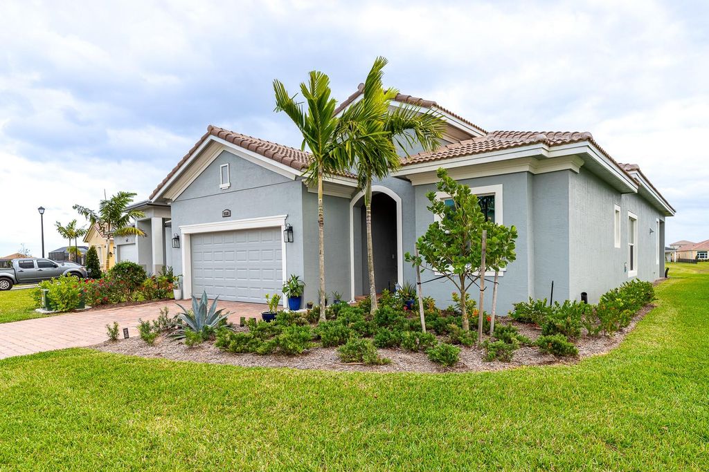 Photo of 9560 SW Pepoli Way, Port Saint Lucie, FL 34987 (MLS # F10412392)