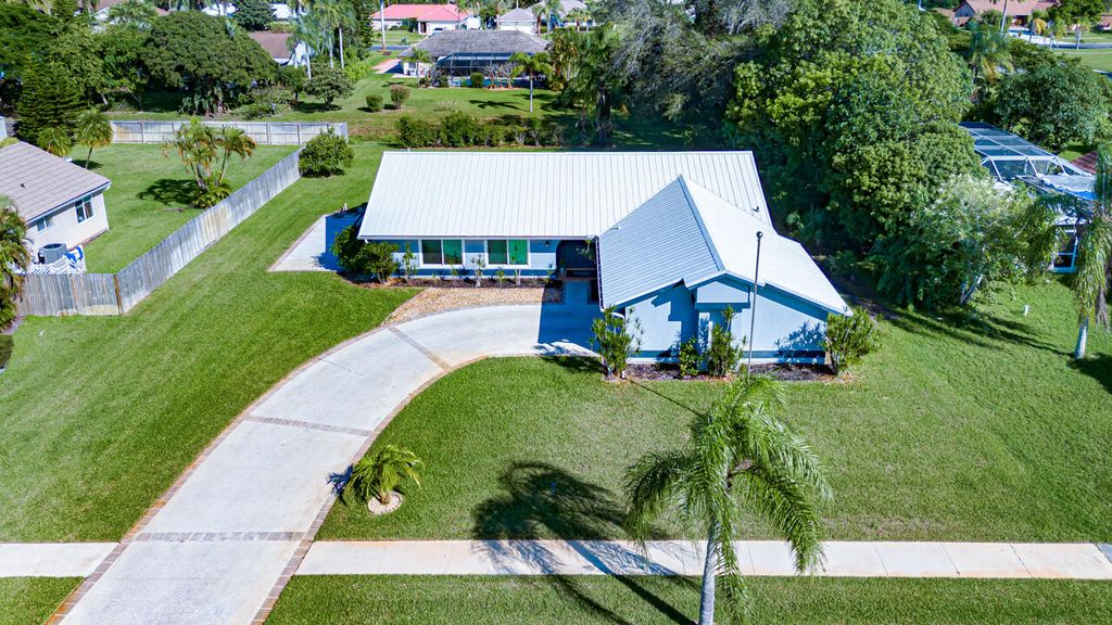Photo of 2473 SE Drayton Road, Port Saint Lucie, FL 34952 (MLS # R11136372)