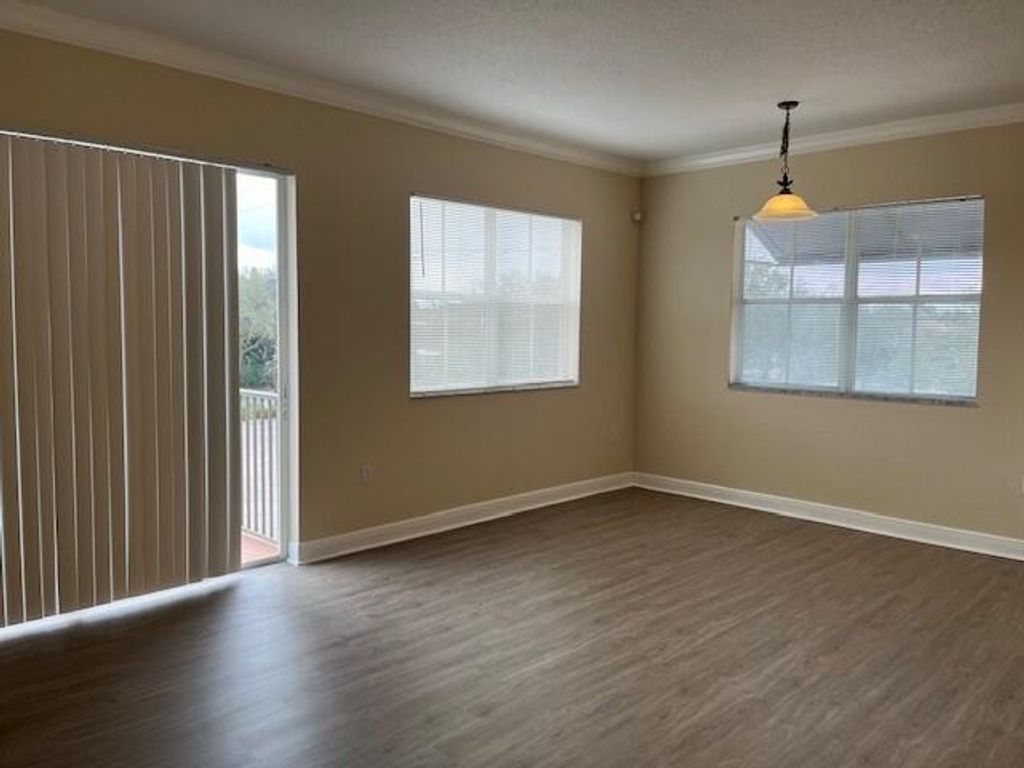 Photo of 4620 Pga Boulevard #203, Palm Beach Gardens, FL 33418 (MLS # R11082764)