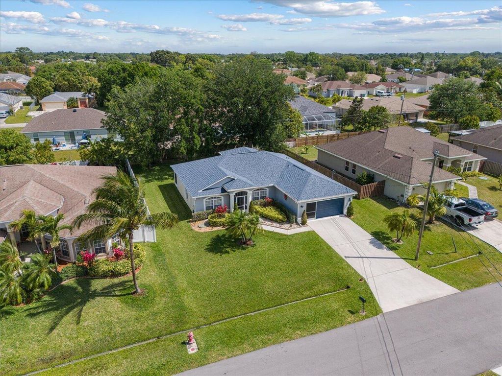 Photo of 1457 SW Oriole Lane, Port Saint Lucie, FL 34953 (MLS # R11078199)