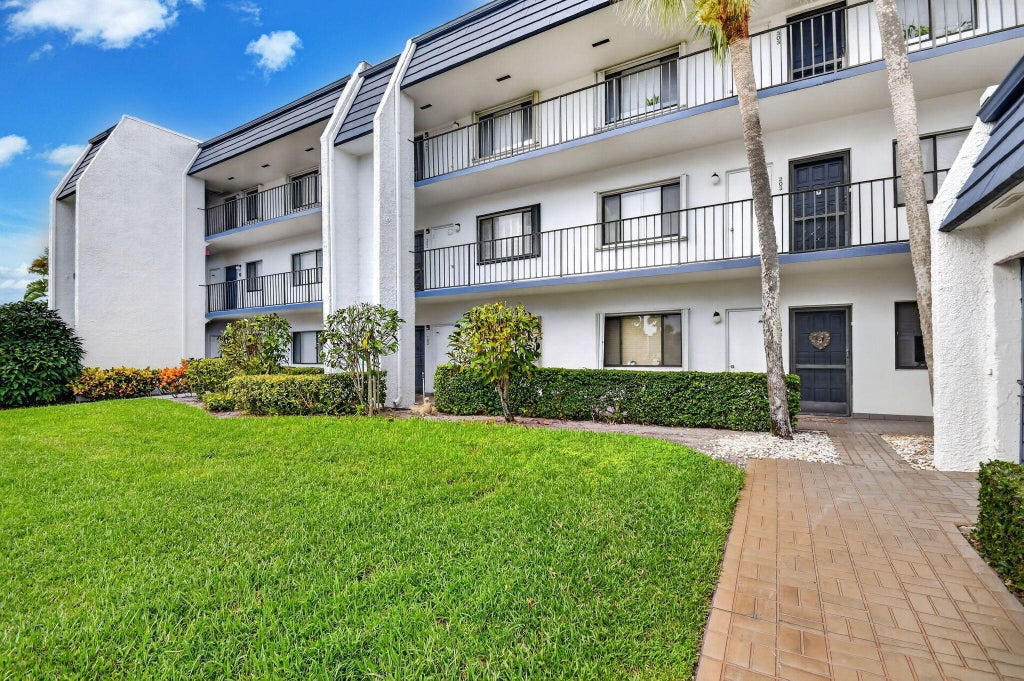 Photo of 4483 LUXEMBURG Court #103, Lake Worth, FL 33467 (MLS # B26068900)