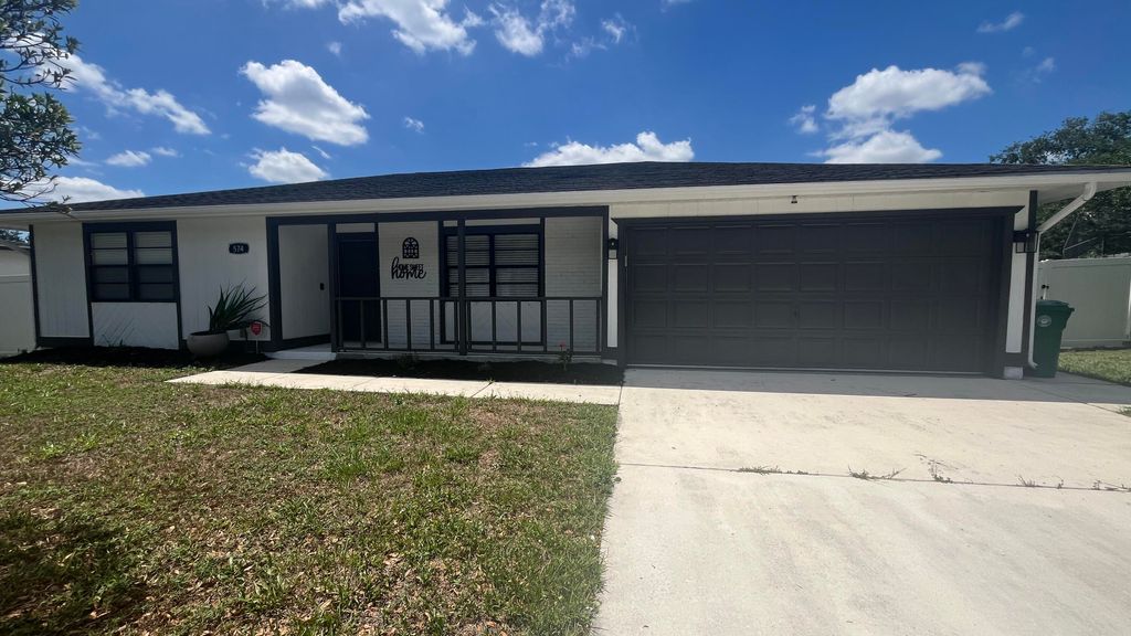 Photo of 574 NW Marion Avenue, Port Saint Lucie, FL 34983 (MLS # R11089640)