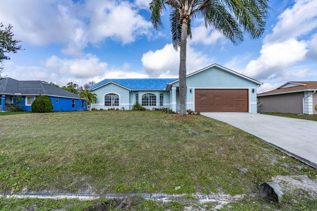 Photo of 125 NE Jettie Terrace, Port Saint Lucie, FL 34983 (MLS # R11158091)