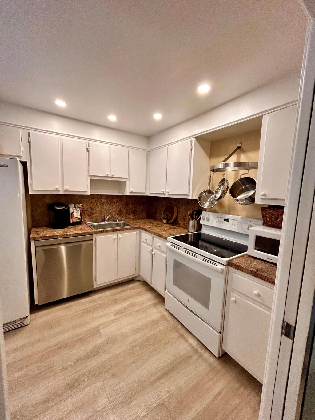 Photo of 3850 OAKS CLUBHOUSE Drive #305, Pompano Beach, FL 33069 (MLS # B26082444)