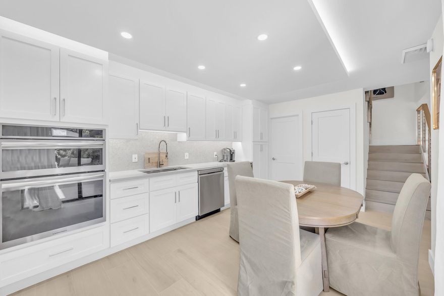 Beautifully renovated townhome in desirable Jupiter just minutes from the beach! This 2BR/2.5BA residence has been completely and extensively updated with a full demo of kitchen and baths. Features include all new cabinetry, quartz countertops, stunning mother-of-pearl backsplash, high-end appliances, new flooring and baseboards throughout, skimmed ceilings, updated lighting fixtures, new toilets, new hardware and plumbing fixtures, and fresh interior paint. Tastefully and fully furnished, this turnkey home is move-in ready—just bring your personal items! Enjoy a large, private outdoor courtyard in a secluded setting surrounded by green space and mature trees. Community amenities include pool, tennis, and bocce ball. Low HOA fees complete this exceptional offering.