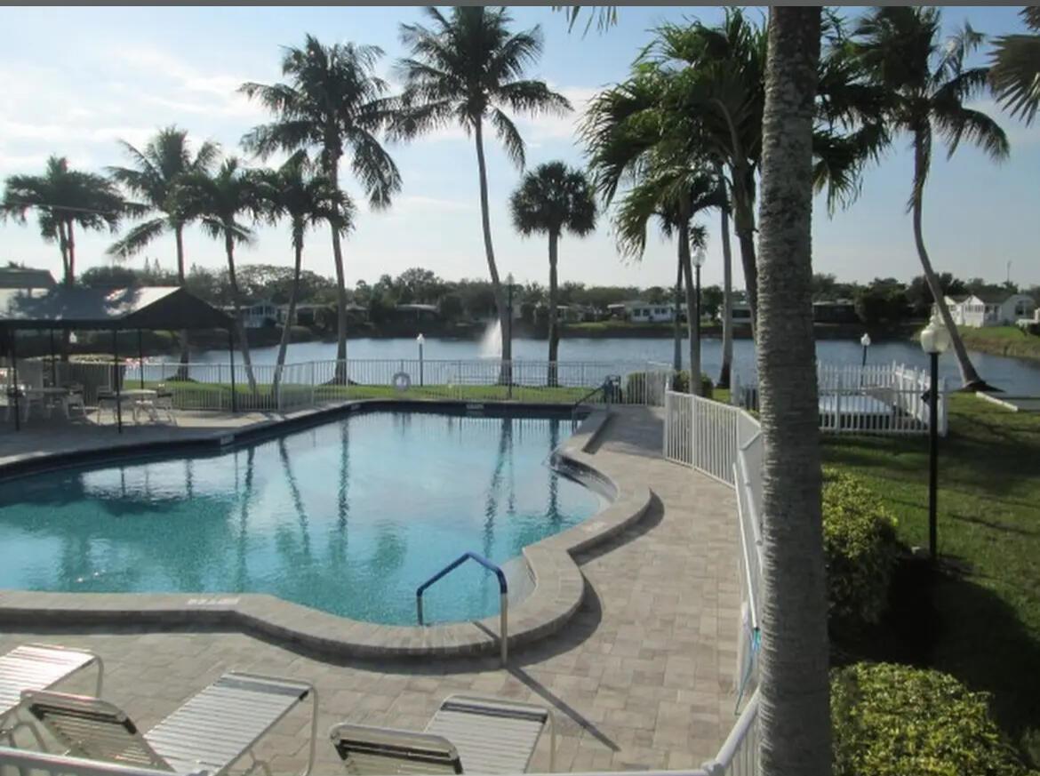 THIS IS A BEAUTIFUL 2/2 NO LAND INCLUDED. COMPLETED RENOVATED. LOCATED WITHIN A PEACEFUL AND GATED COMMUNITY 55+ COMMUNITY. IF OFERS GREAT COMFORT AND SERENITY. THE LOT RENTAL IS $1,106.00 PER MONTH WITH INCLUDE: TRASH REMOVAL, LAWN CARE, AND WATER.