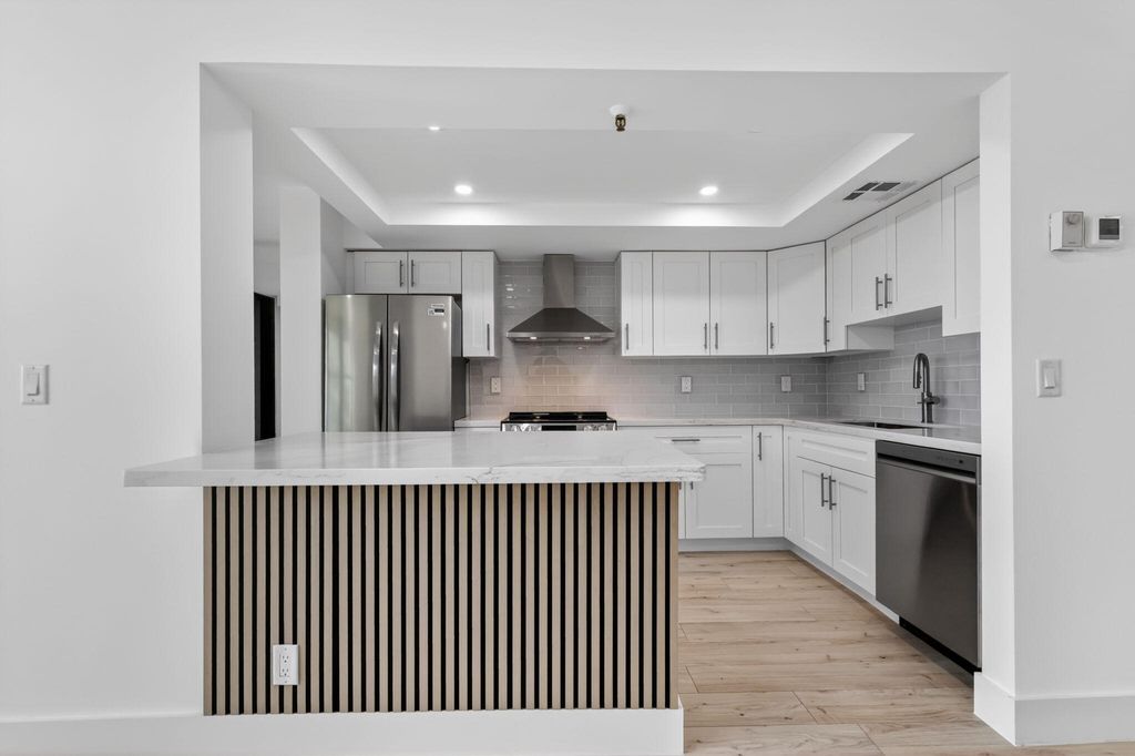 Photo of 1748 Jupiter Cove Drive #319, Jupiter, FL 33469 (MLS # B26022513)