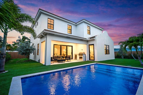 Photo of 309 Cascade Lane, Palm Beach Shores, FL 33404 (MLS # B26038245)