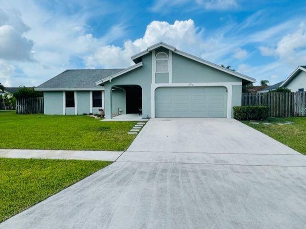 Photo of 174 Roycourt Circle, Royal Palm Beach, FL 33411 (MLS # R10736193)