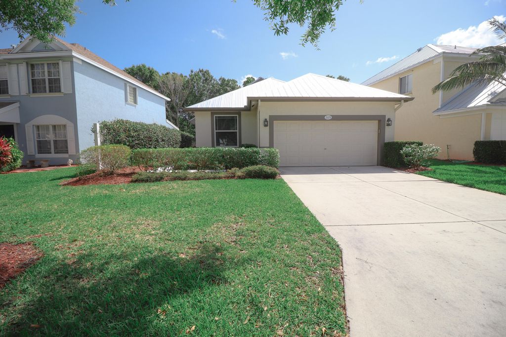 Photo of 3129 SW Solitaire Palm Drive, Palm City, FL 34990 (MLS # R10796649)