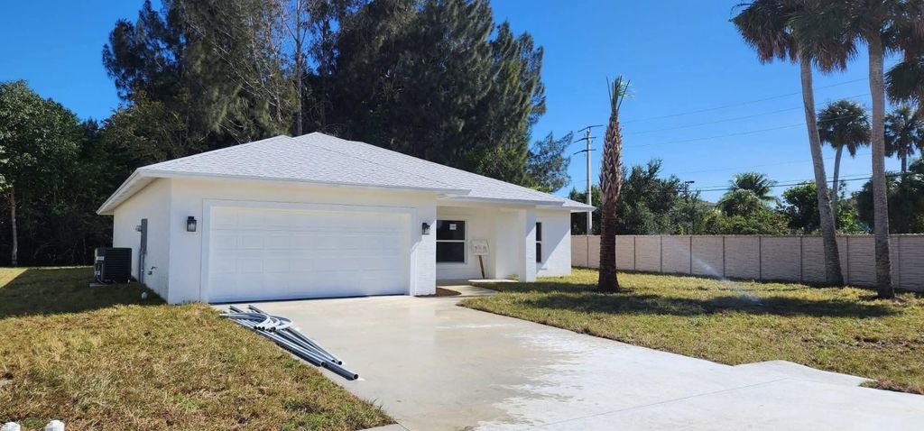 Photo of 6524 Las Palmas Way, Port Saint Lucie, FL 34952 (MLS # F10545545)