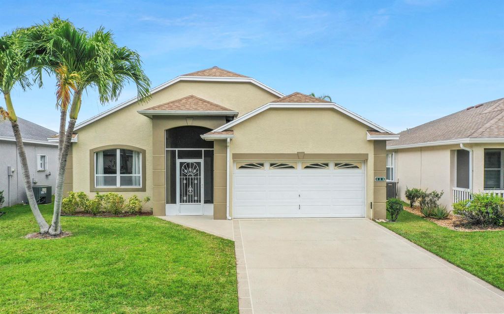Photo of 980 NW Tuscany Drive, Port Saint Lucie, FL 34986 (MLS # R10980768)