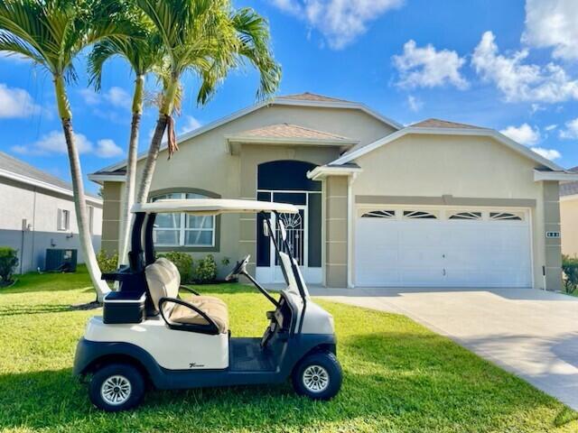 Photo of 980 NW Tuscany Drive, Port Saint Lucie, FL 34986 (MLS # R10980768)
