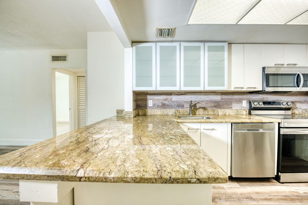 Photo of 714 SE 19th Avenue #5, Deerfield Beach, FL 33441 (MLS # F10496100)