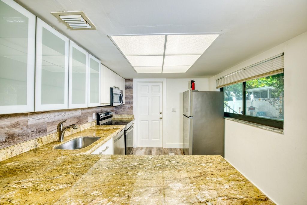 Photo of 714 SE 19th Avenue #5, Deerfield Beach, FL 33441 (MLS # F10496100)