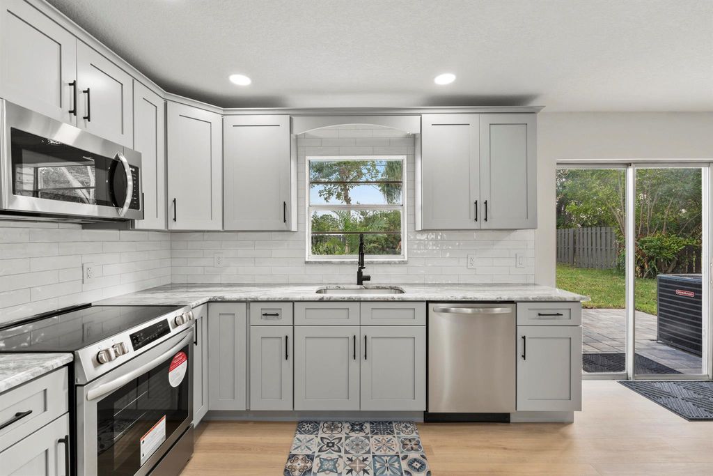 Photo of 2337 NE 16th Court, Jensen Beach, FL 34957 (MLS # R11081462)