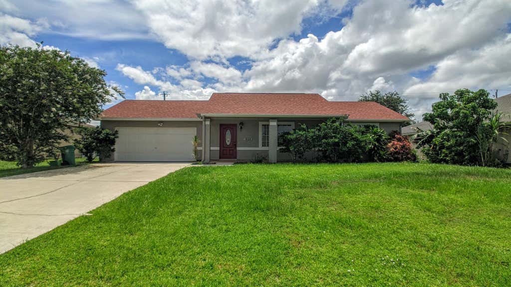 Photo of 1858 SW Davis Street, Port Saint Lucie, FL 34953 (MLS # B26039200)