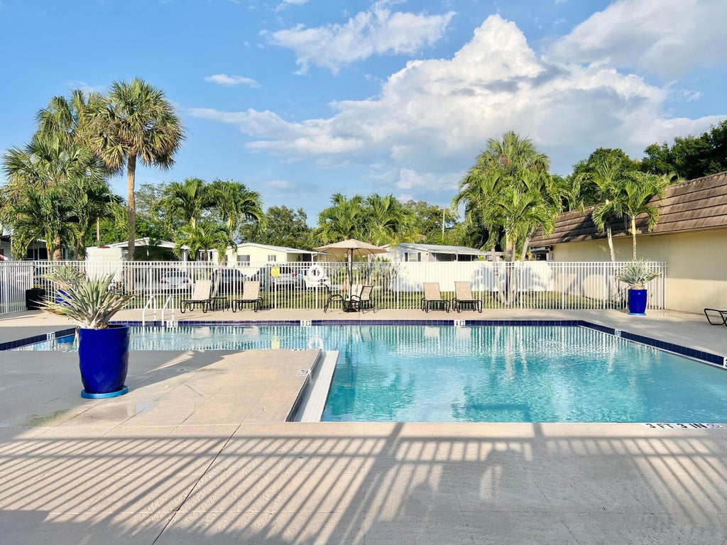Photo of 183 Plantation Boulevard, Lake Worth, FL 33467 (MLS # B26029475)