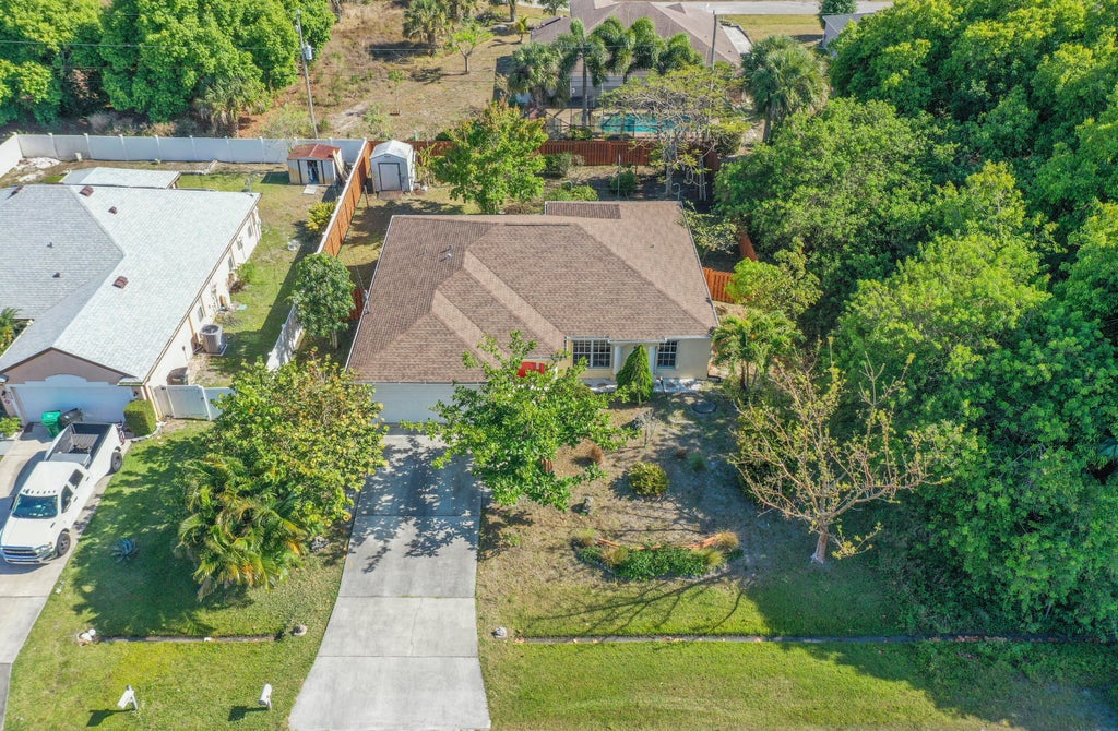 Photo of 938 SW Mccracken Avenue, Port Saint Lucie, FL 34953 (MLS # R10984064)